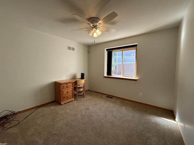 unfurnished bedroom featuring light carpet, visible vents, baseboards, and a ceiling fan