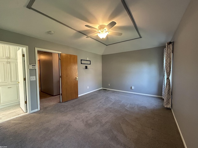 unfurnished bedroom featuring ceiling fan, baseboards, and carpet floors