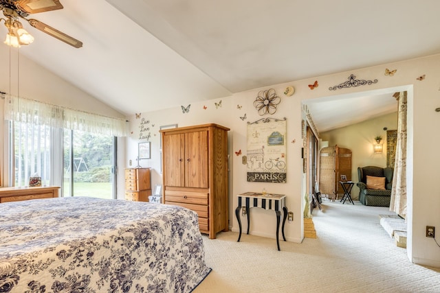 bedroom with access to outside, vaulted ceiling, and light carpet