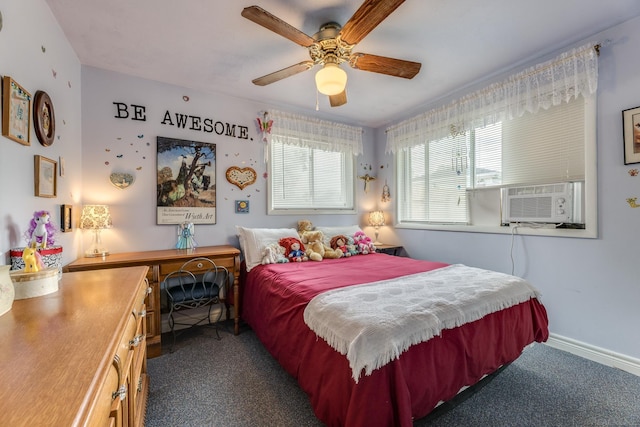 carpeted bedroom featuring cooling unit, ceiling fan, and baseboards