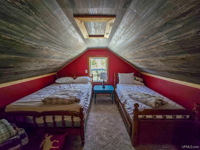 bedroom featuring wooden ceiling, carpet flooring, and vaulted ceiling
