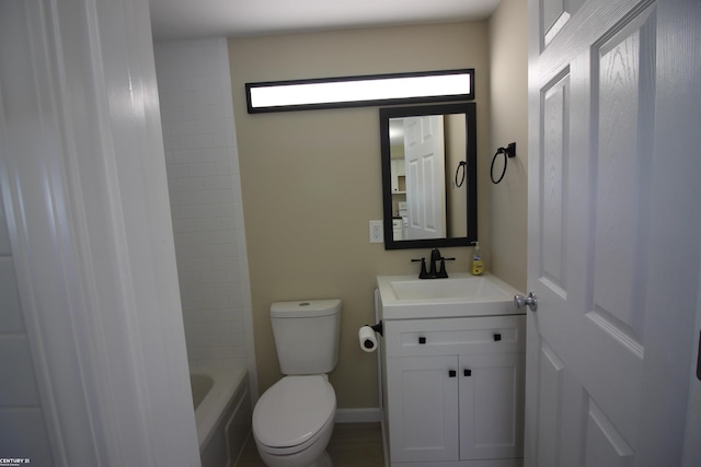full bathroom featuring shower / bath combination, vanity, and toilet