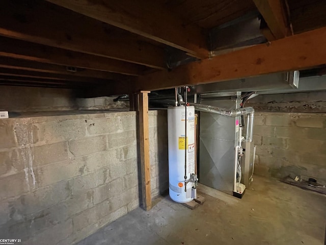 unfinished below grade area with heating unit and gas water heater