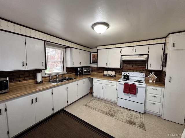 kitchen featuring white cabinets, a sink, electric stove, extractor fan, and decorative backsplash