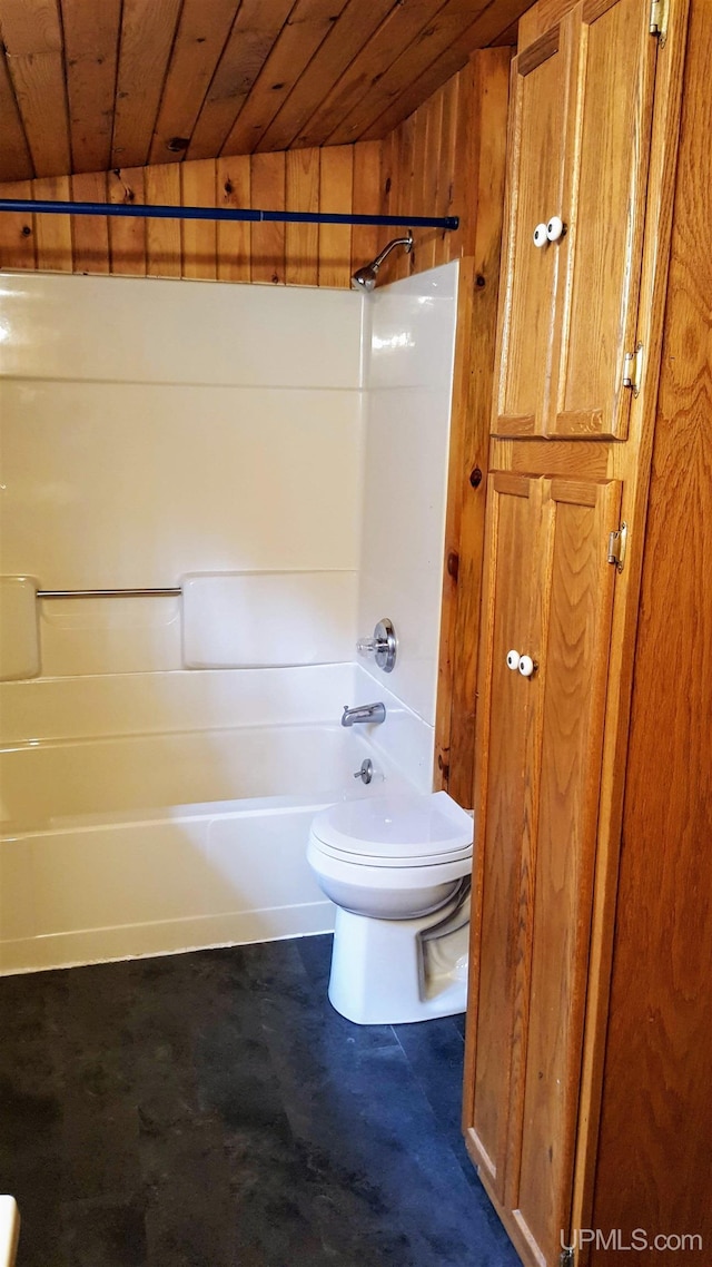 full bath featuring concrete floors, toilet, shower / washtub combination, and wood ceiling