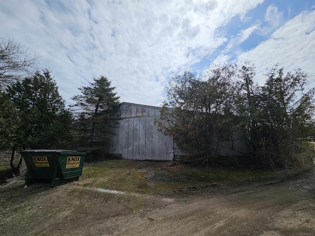 exterior space featuring an outbuilding
