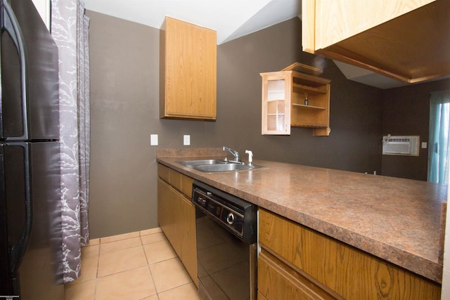 kitchen with vaulted ceiling, a wall mounted air conditioner, light tile patterned flooring, black appliances, and a sink