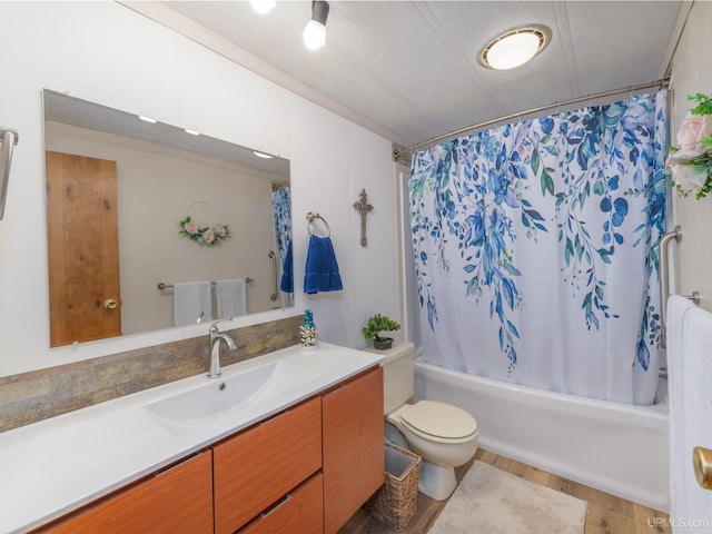full bathroom featuring shower / tub combo with curtain, vanity, toilet, and wood finished floors