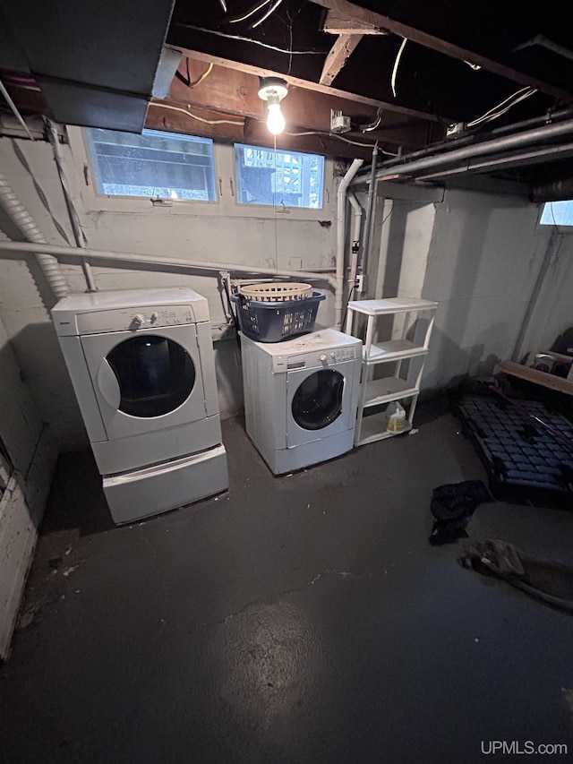 basement with washer and clothes dryer
