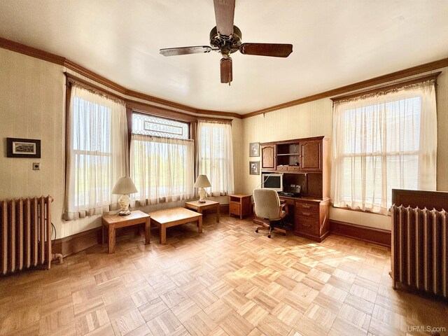 404 Lake Shore Dr, Escanaba, MI 49829 - office with radiator, a ceiling fan, ornamental molding, and baseboards