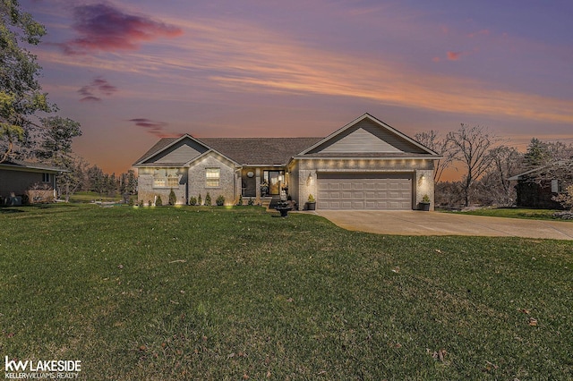 ranch-style house featuring concrete driveway, a front yard, and an attached garage