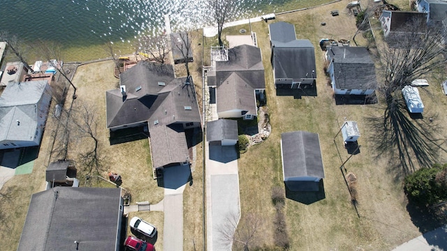 birds eye view of property with a residential view
