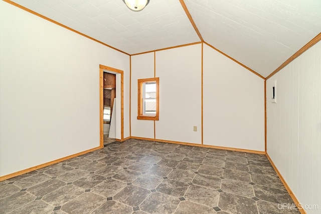 104 Birch St, Bergland, MI 49910 - unfurnished room with stone finish floor, baseboards, ornamental molding, and lofted ceiling