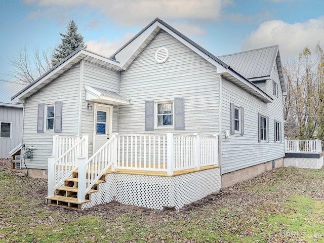104 Birch St, Bergland, MI 49910 - back of property featuring metal roof