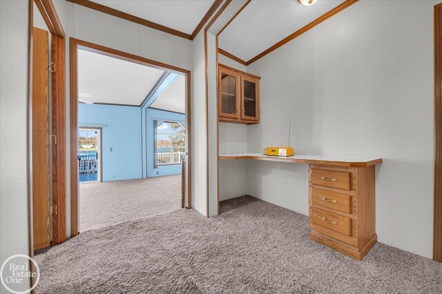 6240 Twin Lakes Dr, Kimball, MI 48074 - unfurnished office featuring built in desk, carpet flooring, ornamental molding, and lofted ceiling