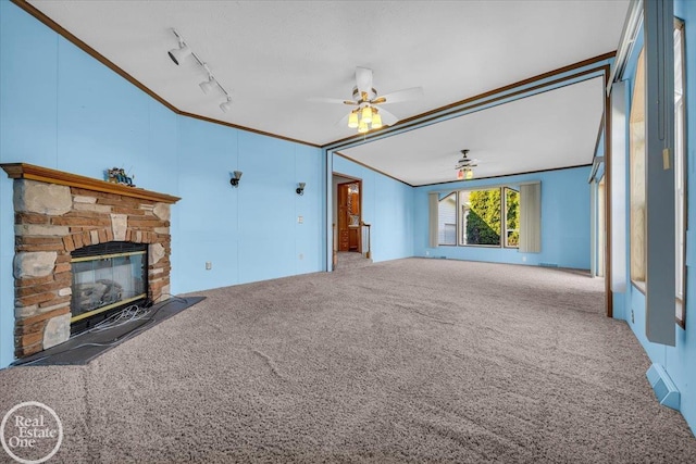 6240 Twin Lakes Dr, Kimball, MI 48074 - unfurnished living room with a ceiling fan, a fireplace, crown molding, carpet floors, and rail lighting