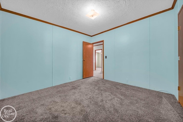 6240 Twin Lakes Dr, Kimball, MI 48074 - unfurnished room featuring crown molding, carpet flooring, and a textured ceiling