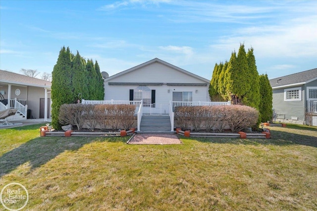 6240 Twin Lakes Dr, Kimball, MI 48074 - back of property featuring a deck and a lawn