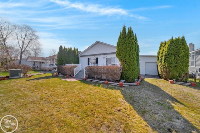 6240 Twin Lakes Dr, Kimball, MI 48074 - view of front facade with a front yard and an outdoor structure