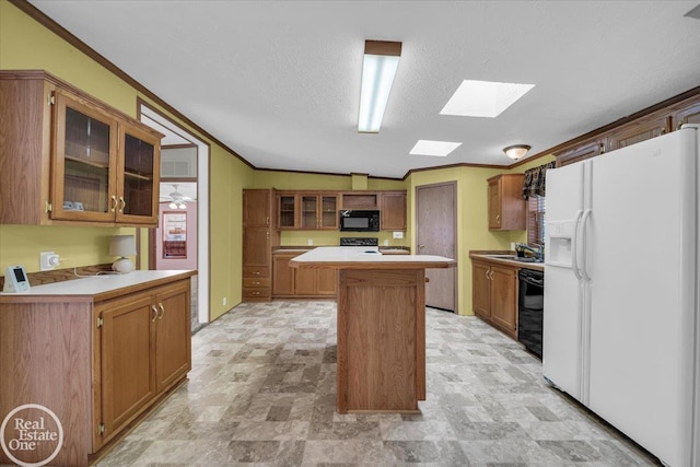 6240 Twin Lakes Dr, Kimball, MI 48074 - kitchen featuring ornamental molding, black appliances, a kitchen island, a skylight, and light countertops