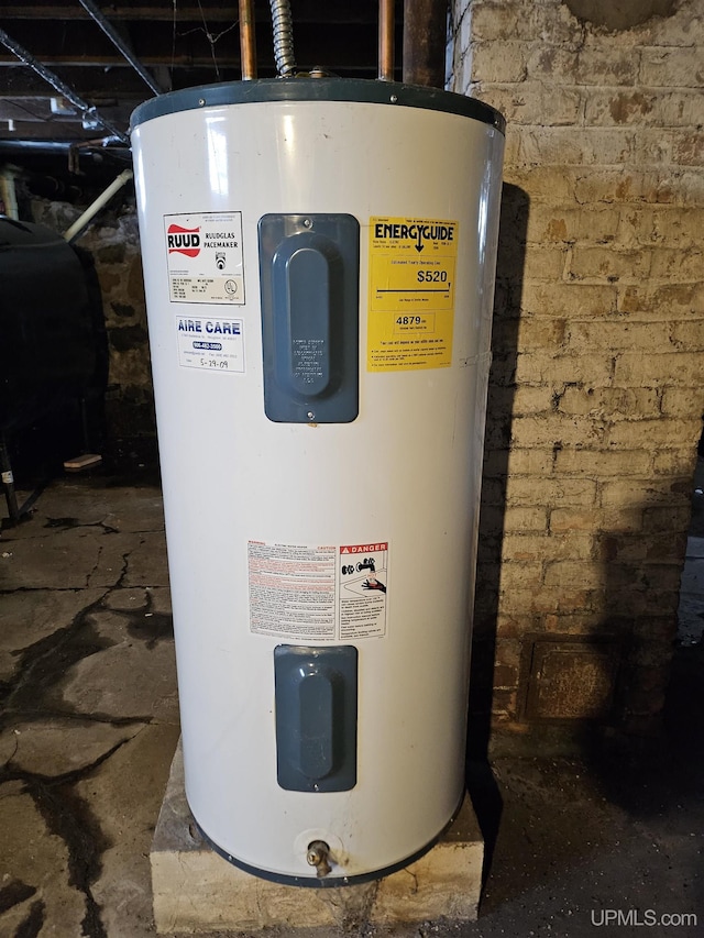 utility room with water heater