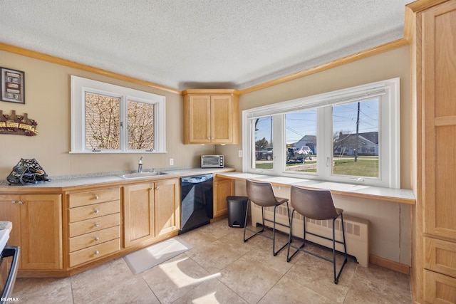 kitchen with a sink, ornamental molding, black dishwasher, and light brown cabinets