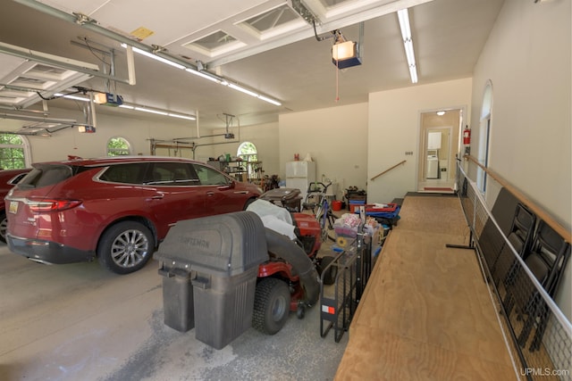 garage featuring a garage door opener