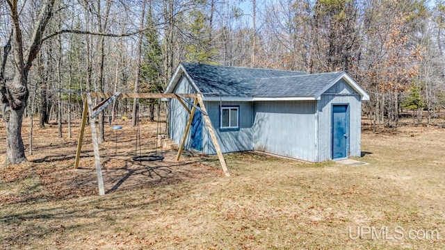 view of outbuilding with an outbuilding