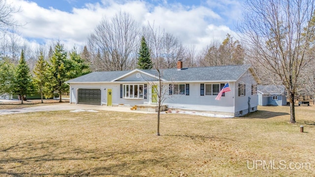 ranch-style house featuring a front yard, a garage, a chimney, driveway, and roof with shingles