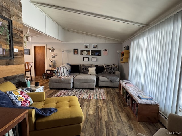 9260 S US Highway 41, Skandia, MI 49885 - living room with baseboard heating, dark wood-style floors, vaulted ceiling with beams, and a healthy amount of sunlight