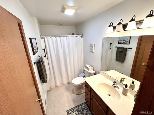 full bath featuring toilet, vanity, and a shower with shower curtain