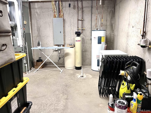 utility room with electric panel and water heater