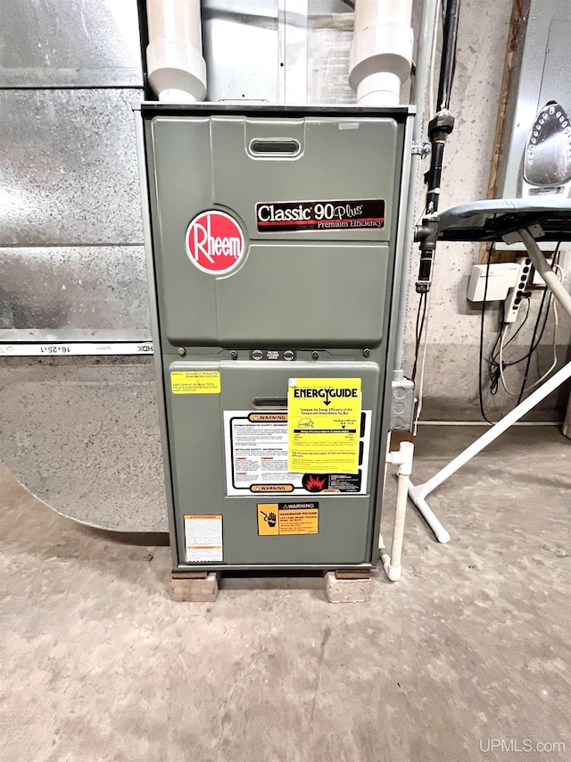 utility room with heating unit