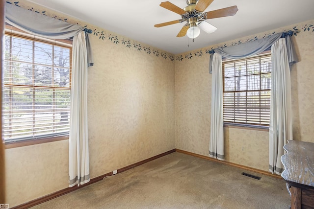 475 S Bartlett Rd, Saint Clair, MI 48079 - carpeted spare room with baseboards, a ceiling fan, and visible vents