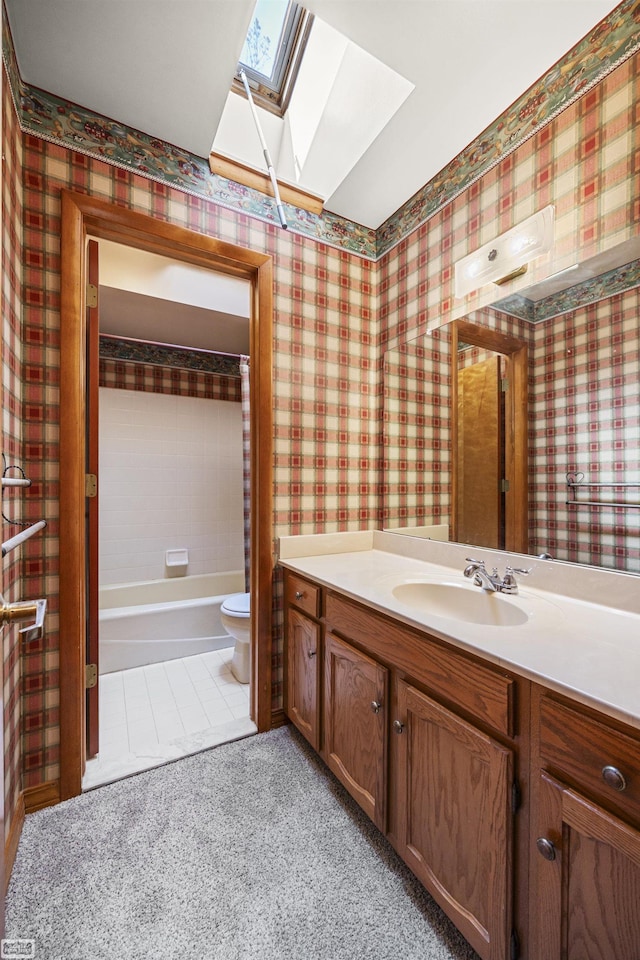 475 S Bartlett Rd, Saint Clair, MI 48079 - full bathroom with wallpapered walls, a skylight, vanity, and toilet