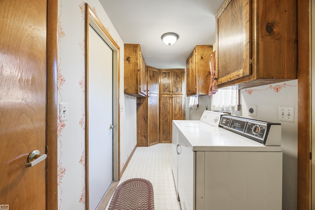 475 S Bartlett Rd, Saint Clair, MI 48079 - washroom featuring independent washer and dryer, light tile patterned floors, and cabinet space