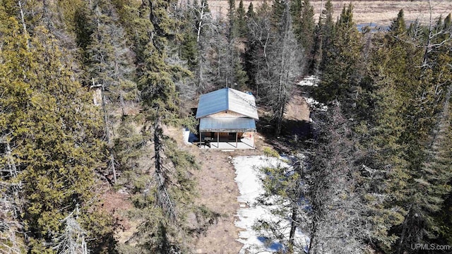 aerial view with a wooded view