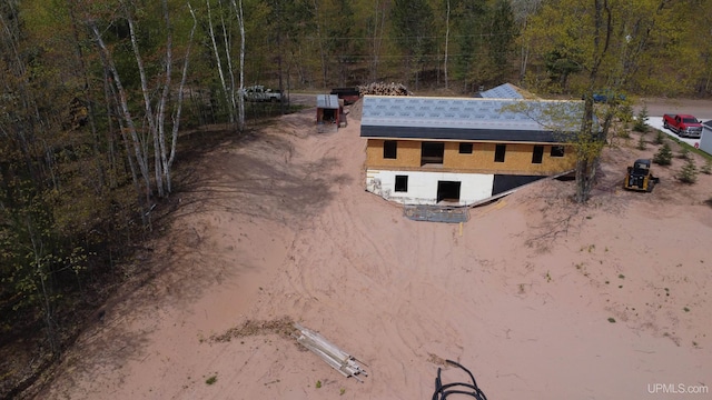 107 Royal Oak Ln, Marquette, MI 49855 - aerial view of property and surrounding area featuring a heavily wooded area