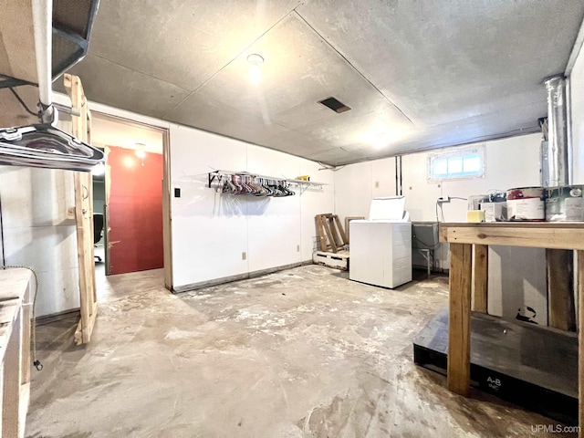basement with washer / dryer