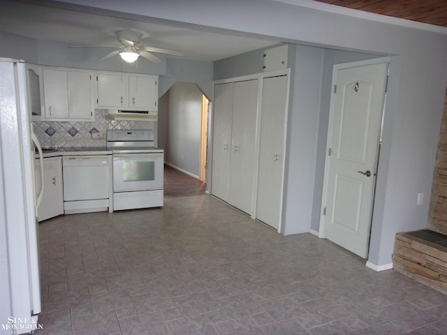 kitchen featuring a ceiling fan, white appliances, baseboards, tasteful backsplash, and white cabinetry