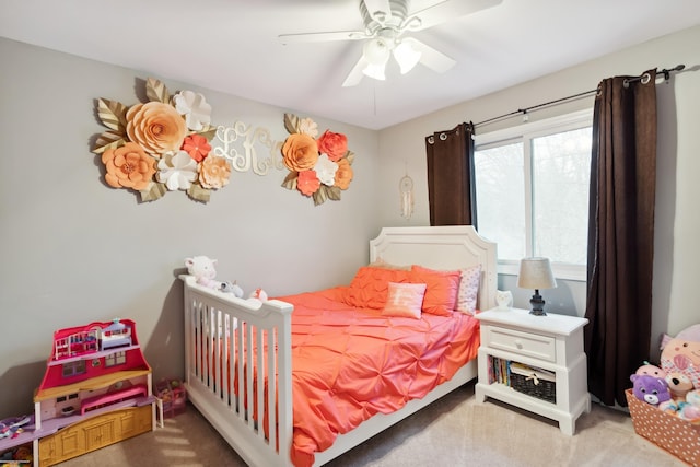 bedroom with carpet and a ceiling fan