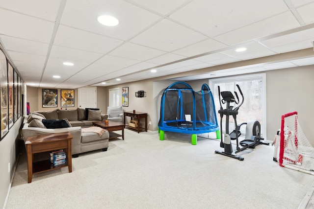 workout room with recessed lighting, carpet flooring, and a drop ceiling