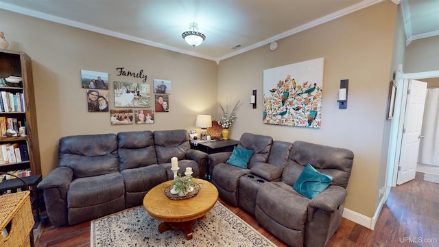 living area with wood finished floors, visible vents, crown molding, and baseboards