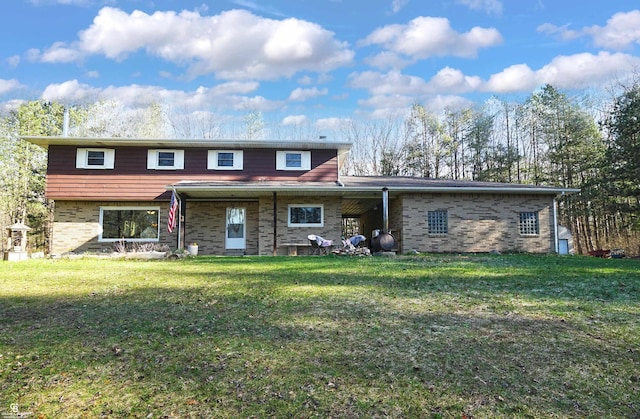 view of front of home with a front lawn