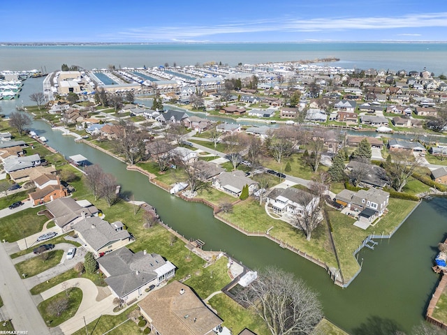 aerial view featuring a water view and a residential view
