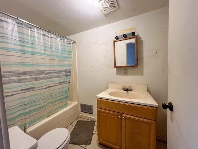 full bath featuring tile patterned flooring, visible vents, toilet, and vanity