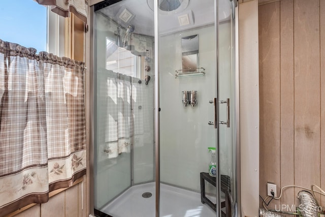 bathroom with a shower stall