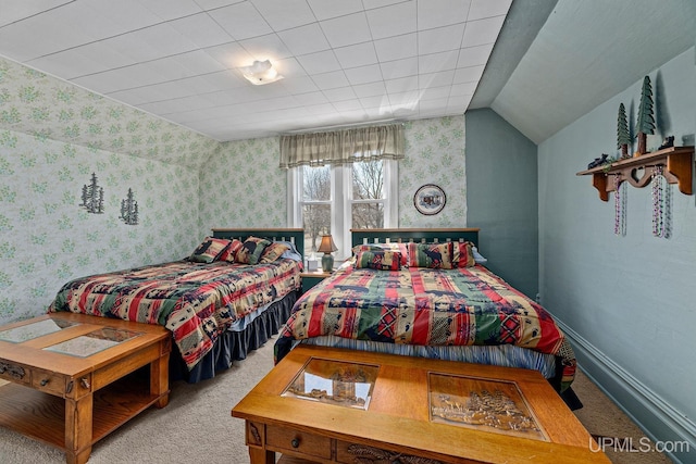 carpeted bedroom with wallpapered walls