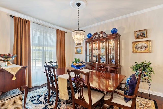 dining area featuring a chandelier, baseboards, crown molding, and dark wood-style floors