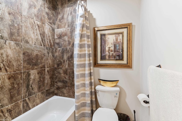 full bath featuring shower / bath combo and toilet